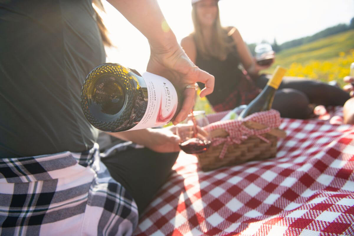 Wine bottle in field